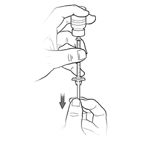 Hand holding syringe and vial. Syringe is underneath vial with fingers pulling out plunger.